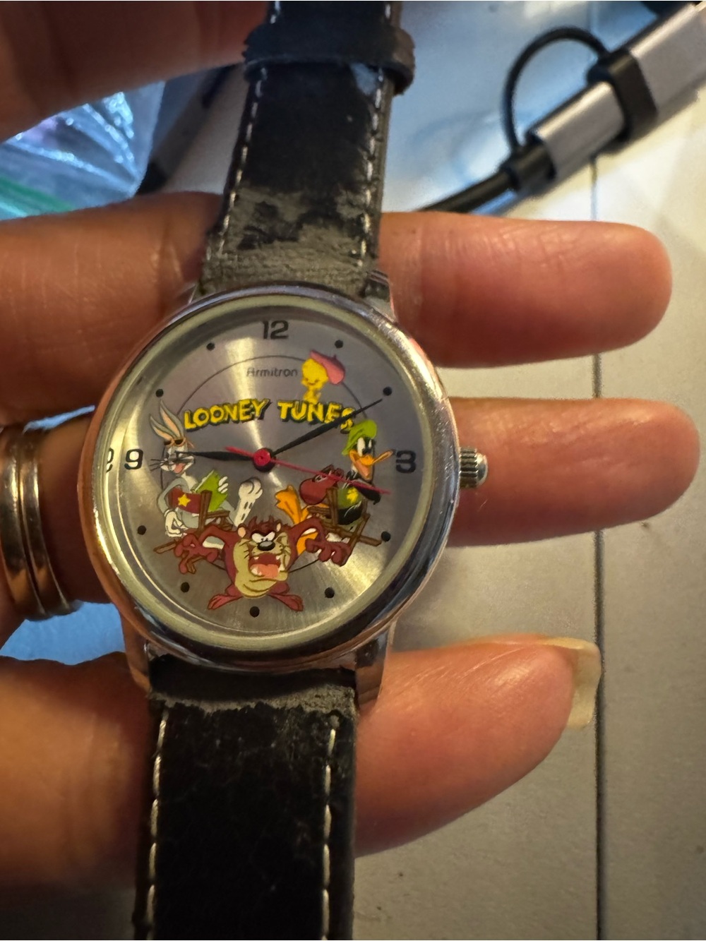 Warner Bros. Silver Case Wristwatch with Black Strap